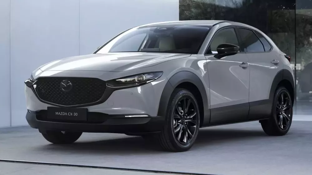 Mazda CX-30 2027 ra mắt, được trang bị đèn pha Matrix LED "xịn sò" hơn và vẫn có hộp số sàn - Ảnh 1. Mazda CX-30 2027 ra mắt, được trang bị đèn pha Matrix LED "xịn sò" hơn và vẫn có hộp số sàn - Ảnh 1.